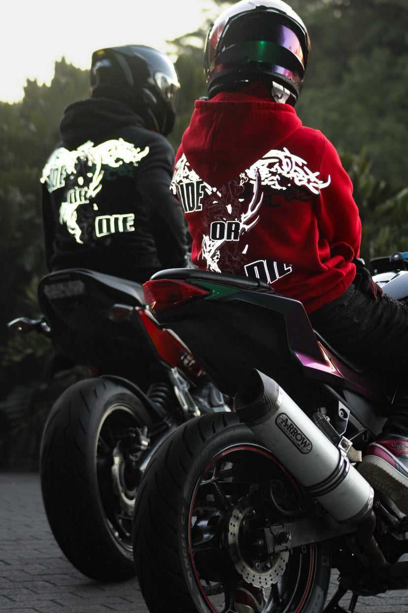 two riders wearing Australian motorcycle hoodies with reflective panels while sitting on their motorbikes